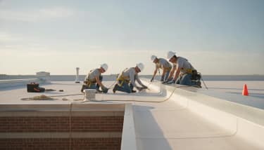 Commercial roofing professional inspecting a Texas commercial roof